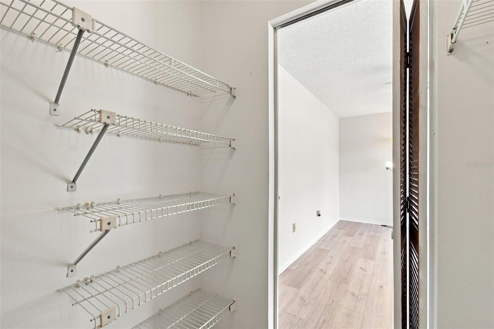 BR 2 Walk-In Closet - 7610 OAKMONT LN, NEW PORT RICHEY