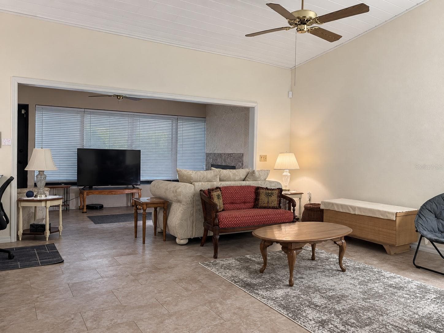 Living room facing Bonusroom and fireplace - 505 CLUBHOUSE DR, LAKE WALES