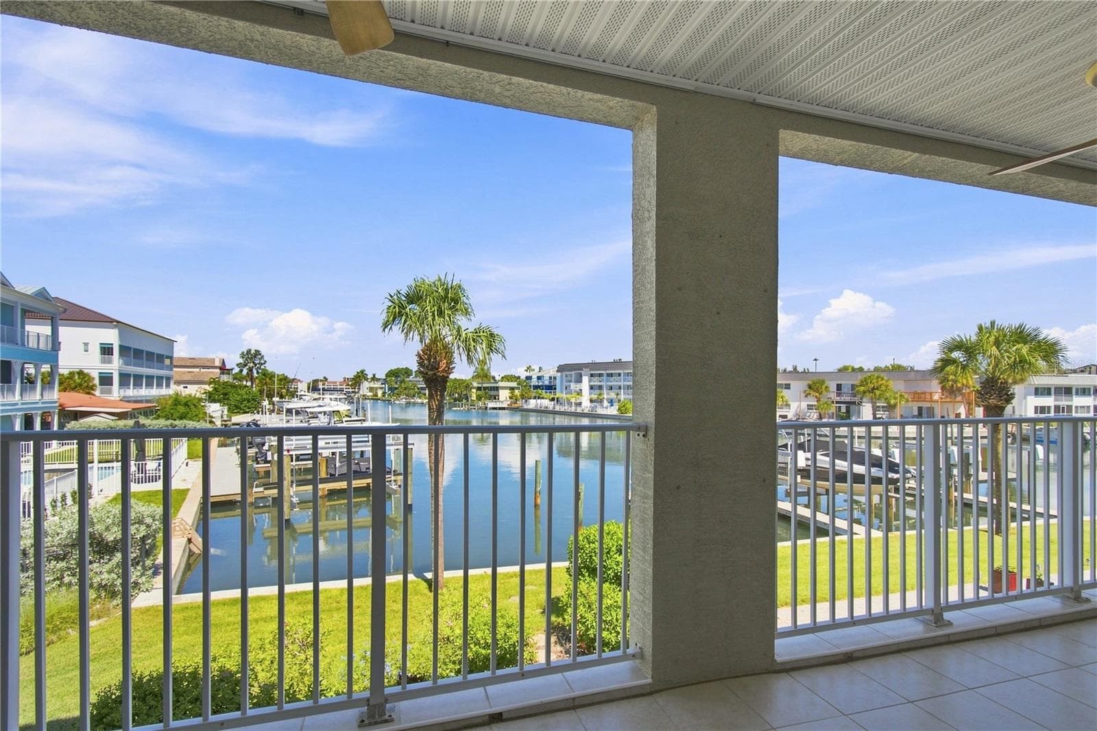 24' long balcony with a unbeatable water view on a flow through canal full of marine life. - 152 117TH AVE, TREASURE ISLAND
