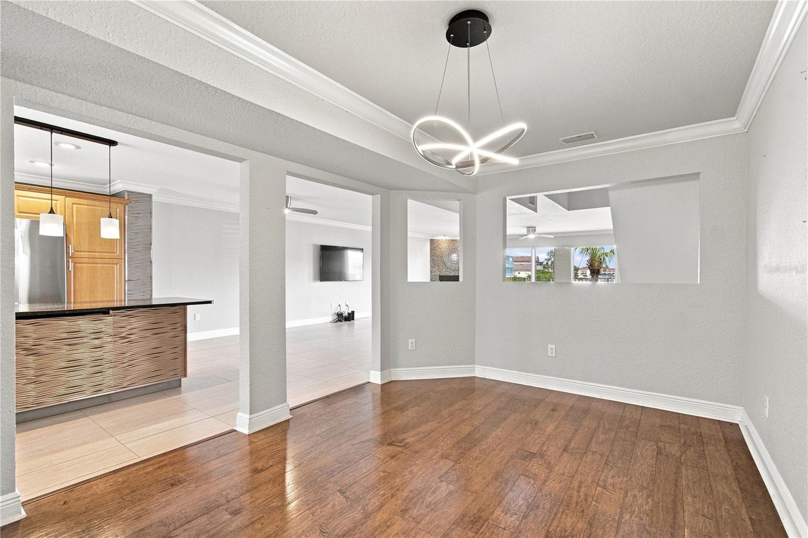 This formal dining room could easily be an office with a view. - 152 117TH AVE, TREASURE ISLAND