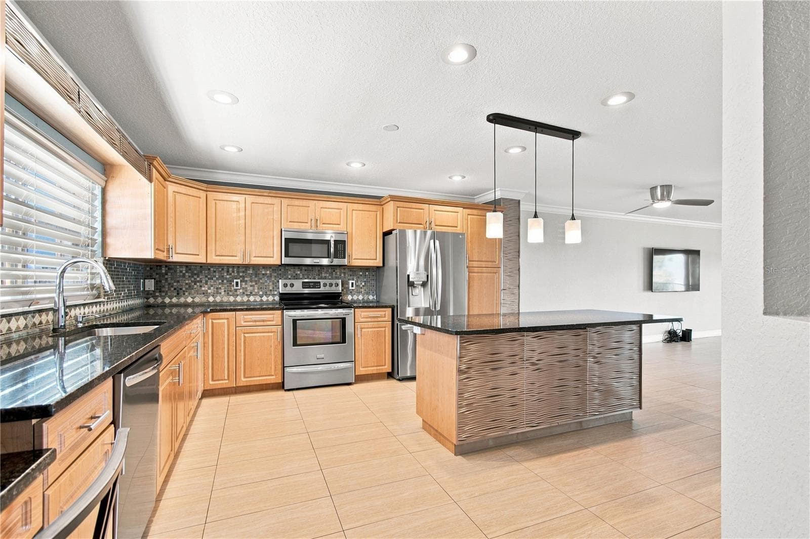 This townhouse feels more like a single-family home due to its nice wide layout. - 152 117TH AVE, TREASURE ISLAND