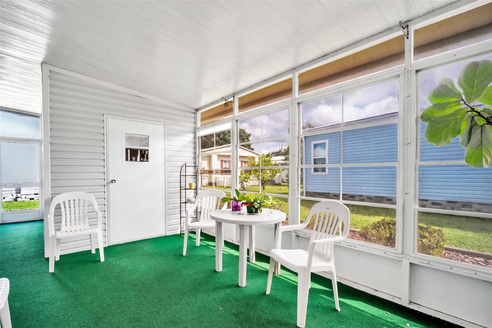 Screened in Lanai, storage room - 428 PELICAN DR S, OLDSMAR