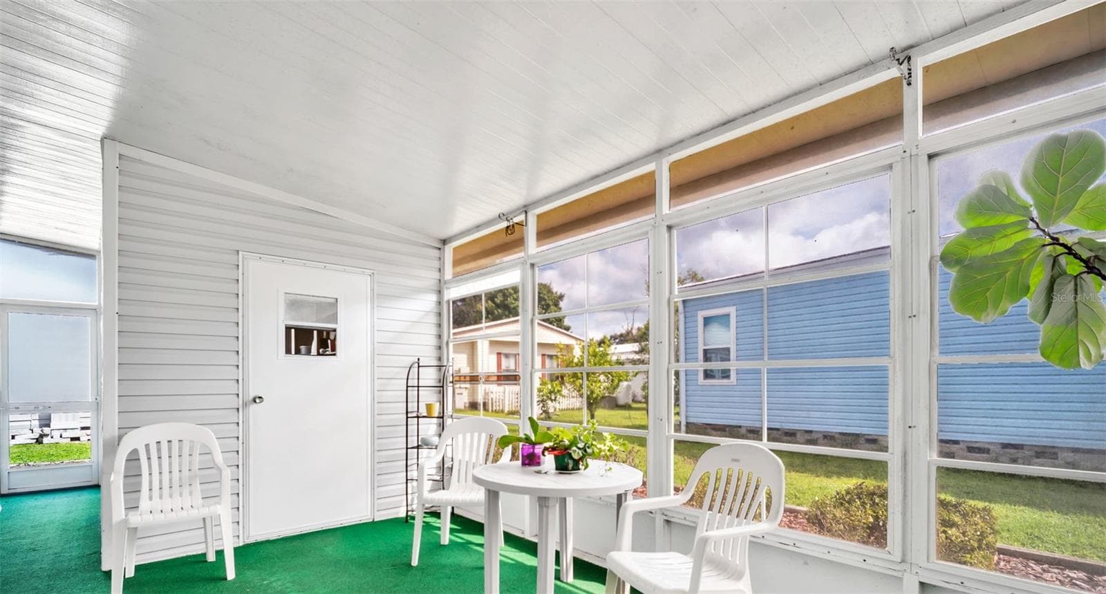 Screened in Lanai, storage room - 428 PELICAN DR S, OLDSMAR