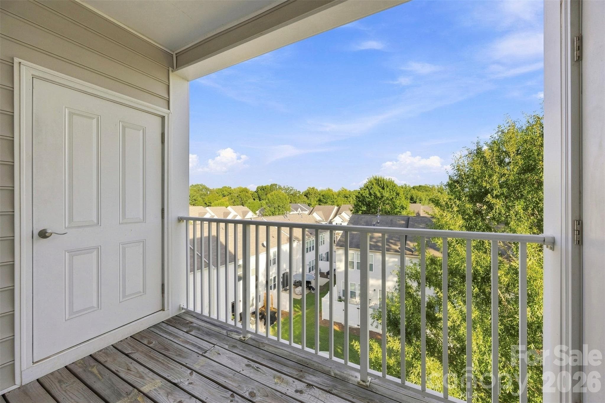 Covered balcony wtth storage closet, overlooking courtyard. - 6605 Central Pacific Avenue, Charlotte