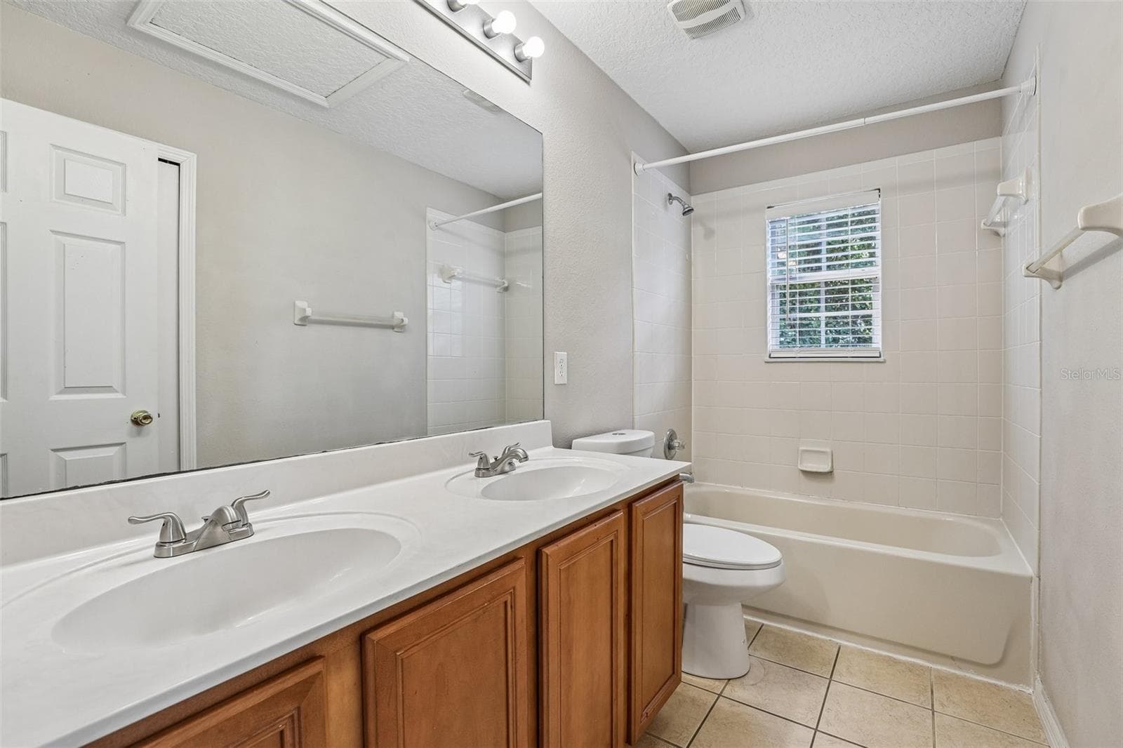 Third full bath. - 10411 KRISTEN PARK DR, ORLANDO