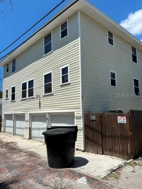 alley view of garage, apartments - 717 DARTMOOR ST N, ST PETERSBURG