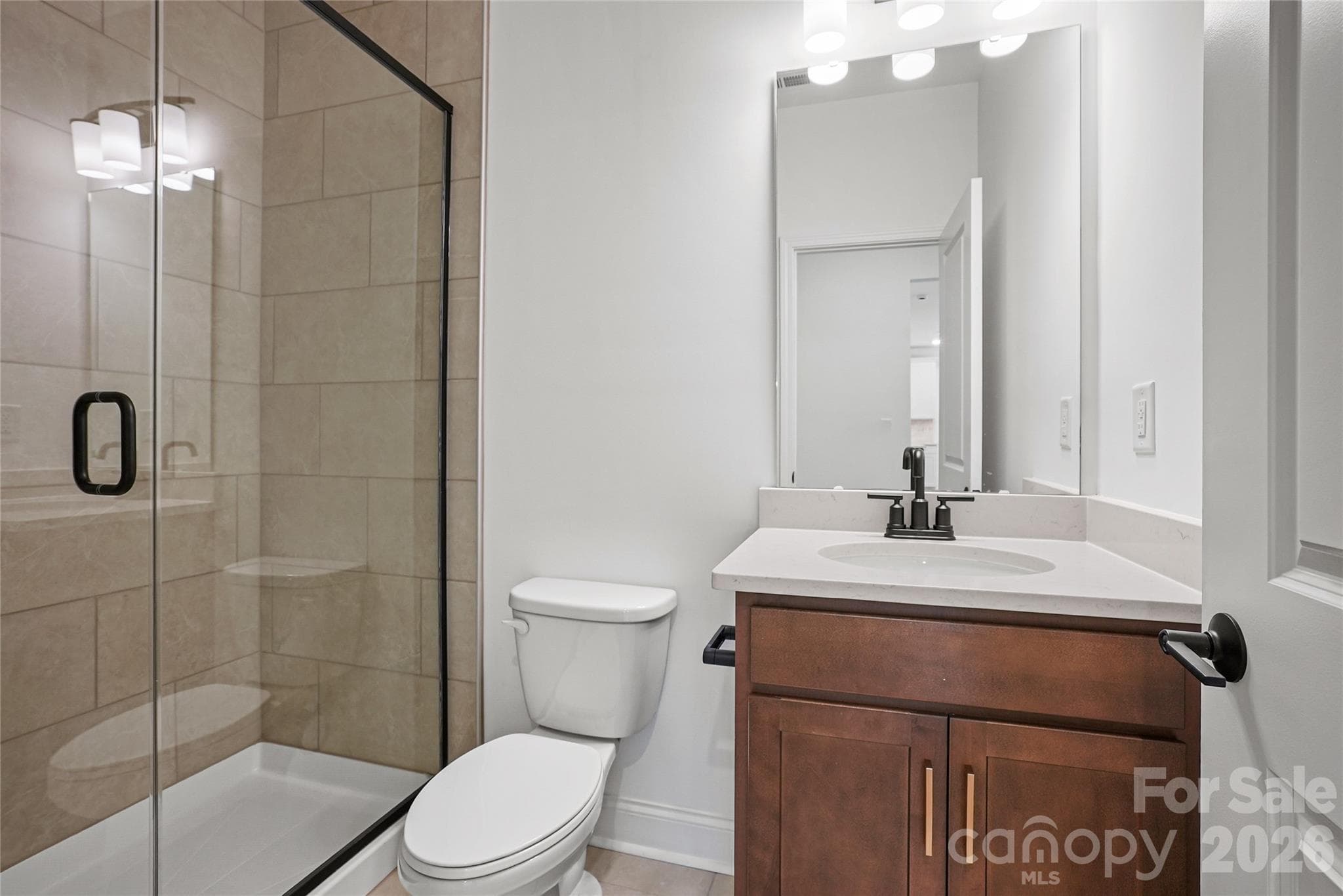 1st floor full guest bathroom - 1210 Chasity Trails Court, Matthews