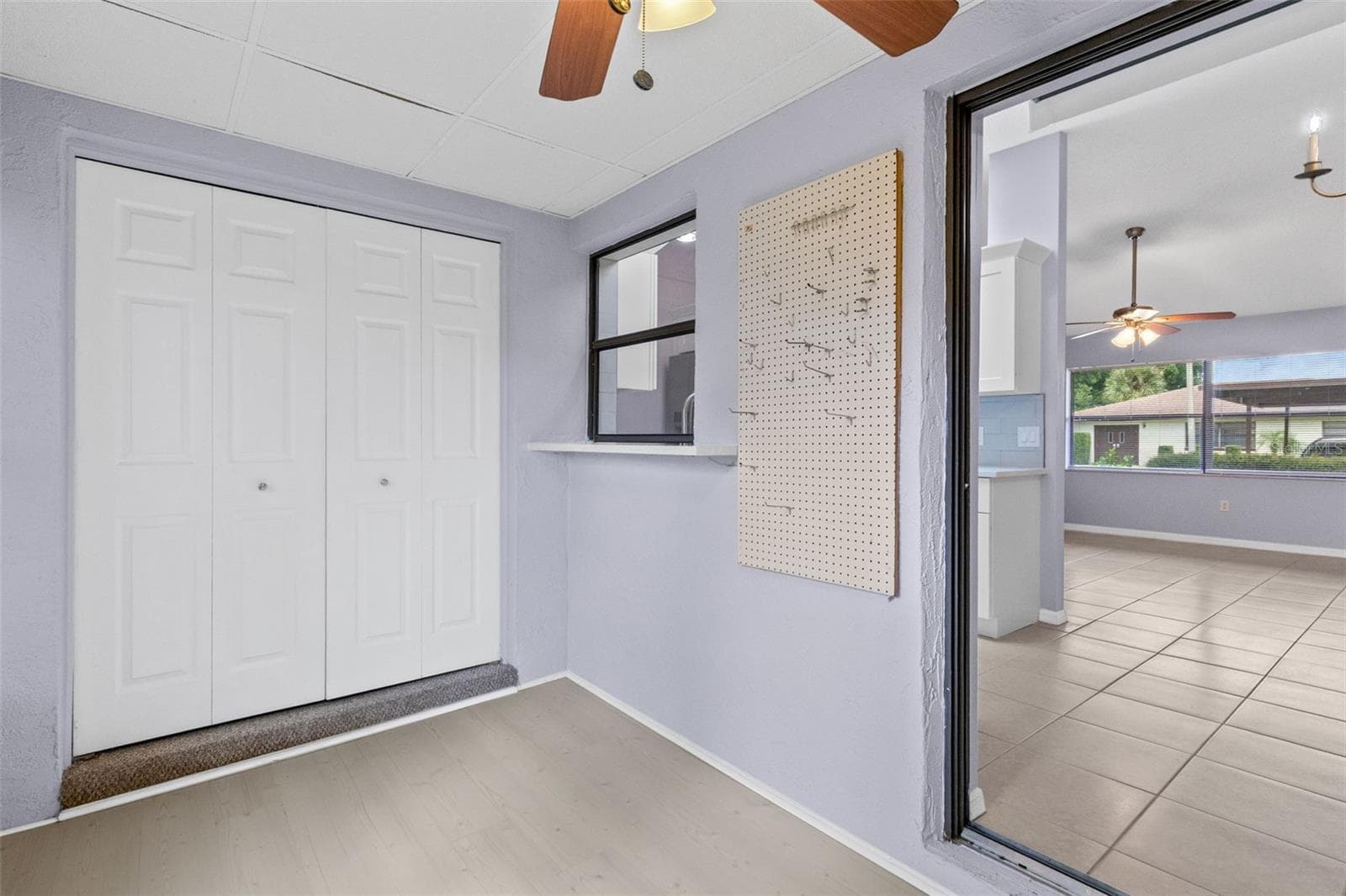 Florida Room and Laundry Room - 12422 CLUBHOUSE CT, TAVARES