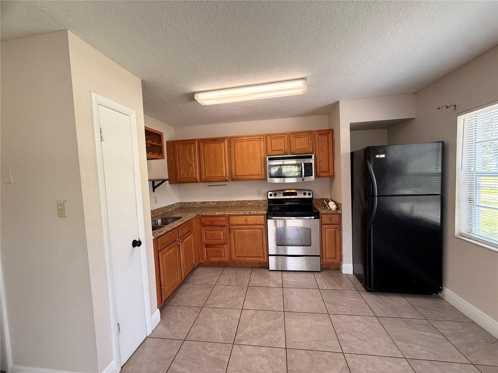 Half Duplex at 10123 N 11TH ST #A, TAMPA, photo 10 of 24