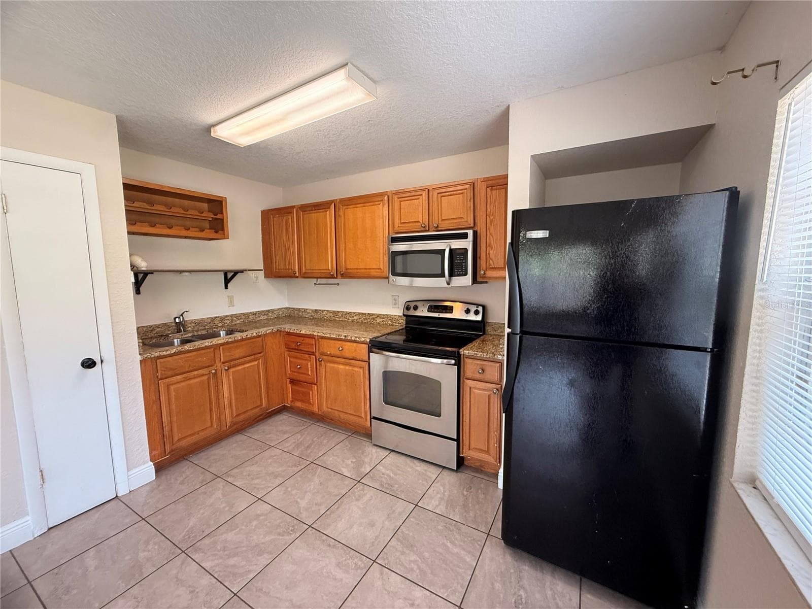 Half Duplex at 10123 N 11TH ST #A, TAMPA, photo 14 of 24