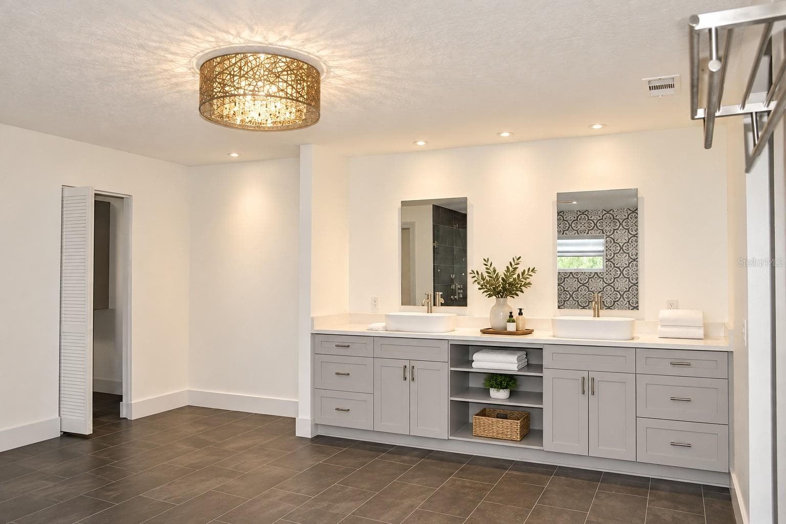 En-suite bathroom with double vanity - 9865 SW 74TH AVE, OCALA