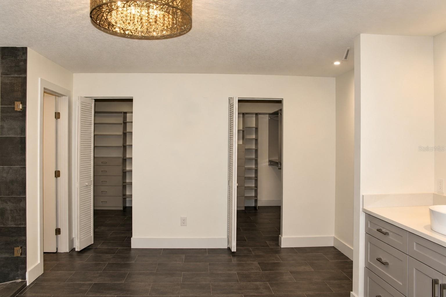 View of walk-in closets entrance - 9865 SW 74TH AVE, OCALA