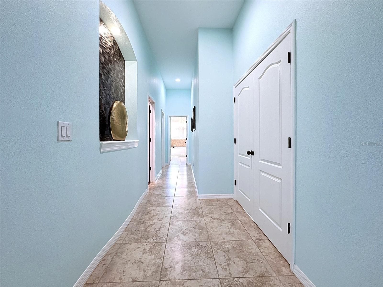 Long Hallway from Private Prim BD to Prim Bath - 210 166TH ST NE, BRADENTON