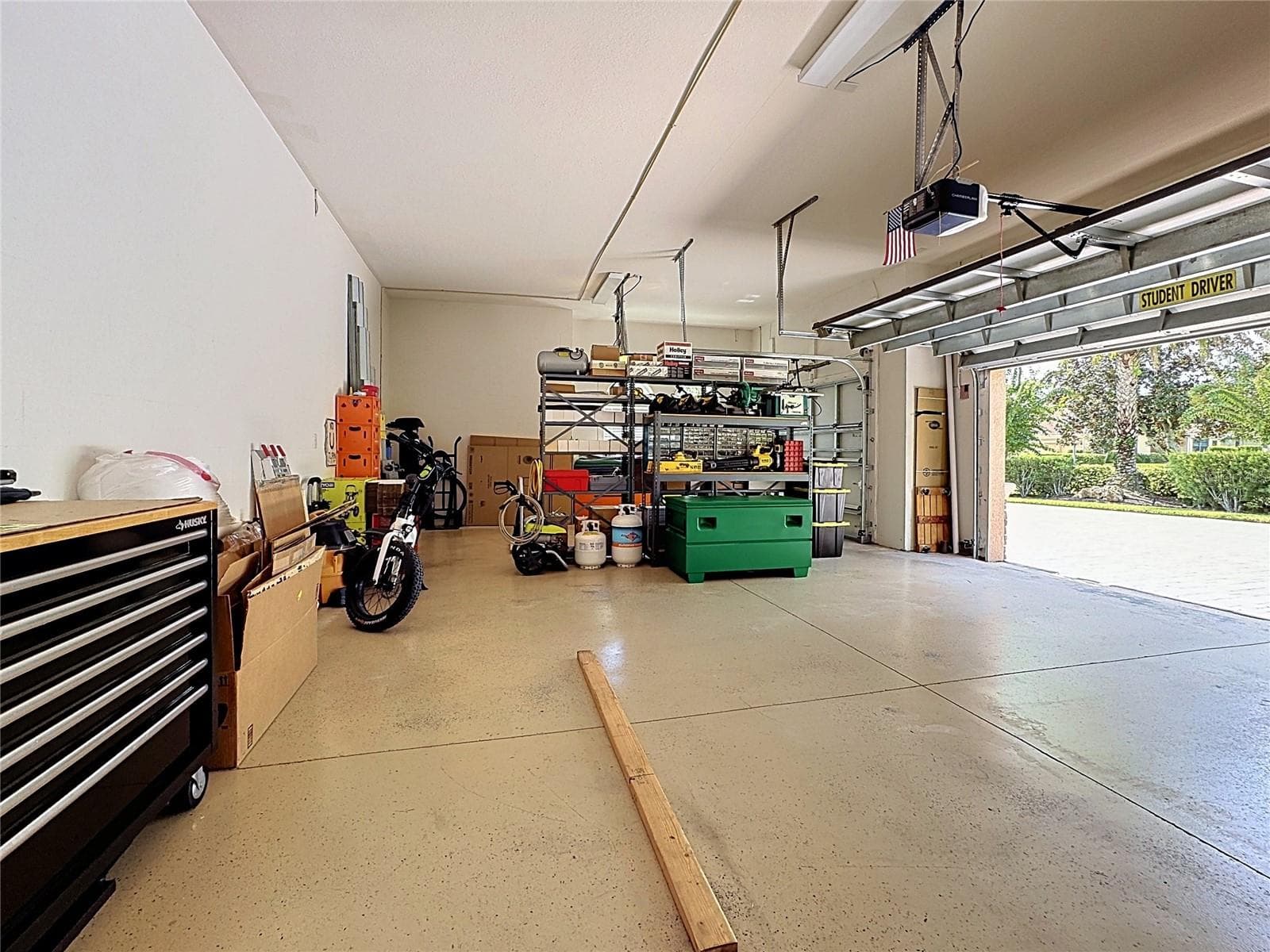 11 Ft Ceilings in the garage for a possible car lift. - 210 166TH ST NE, BRADENTON