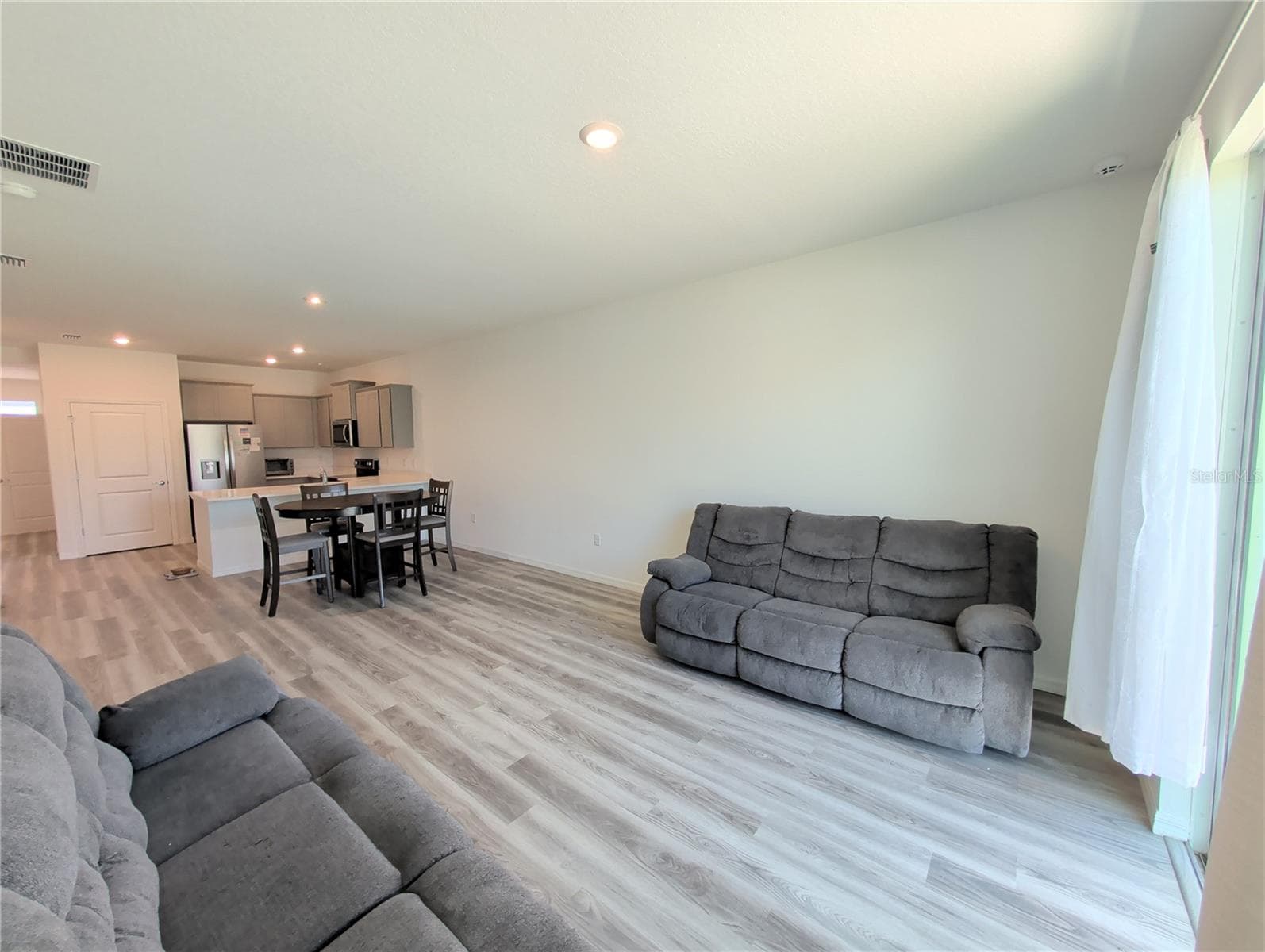 Great Room and Kitchen - 4057 WESTWOOD FIELDS LOOP, PLANT CITY