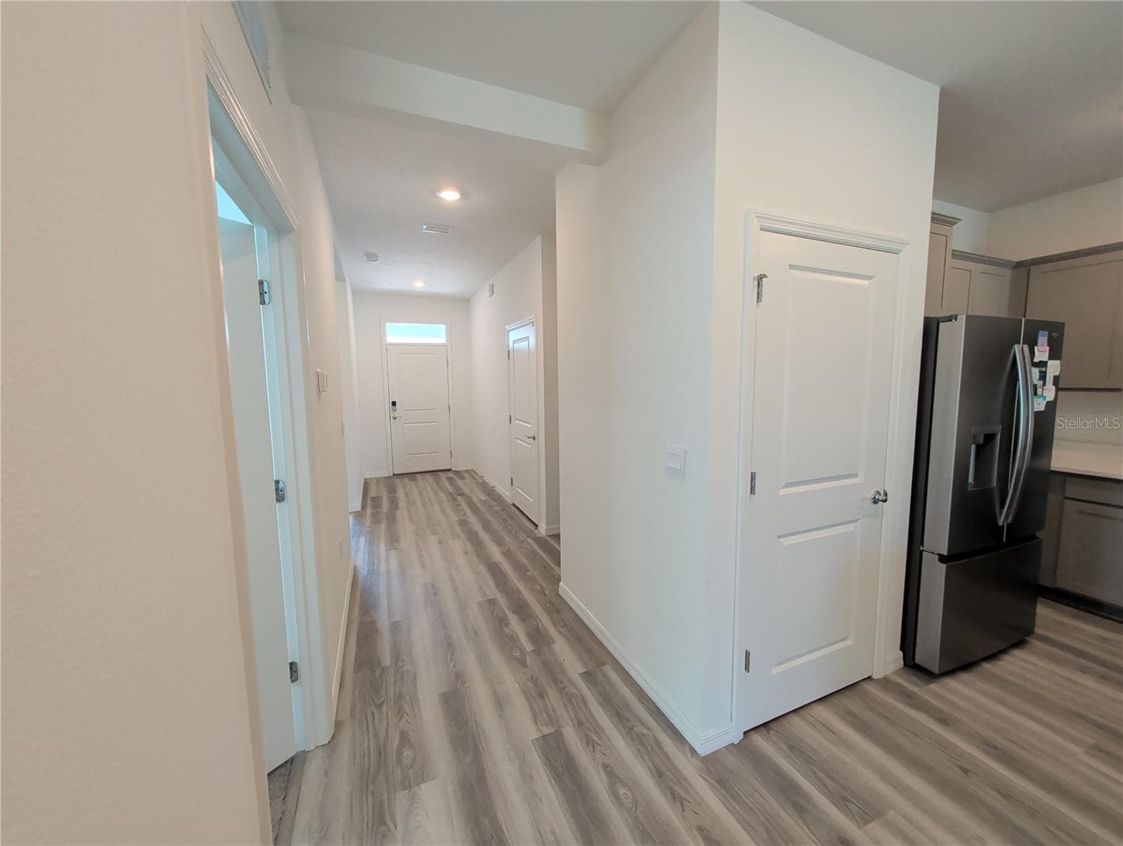 Entrance hallway. 2nd bedroom door on L of picture - 4057 WESTWOOD FIELDS LOOP, PLANT CITY