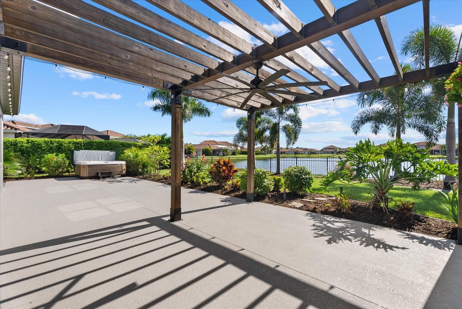 Custom pergola over backyard patio - 3536 BIG SKY WAY, BRADENTON
