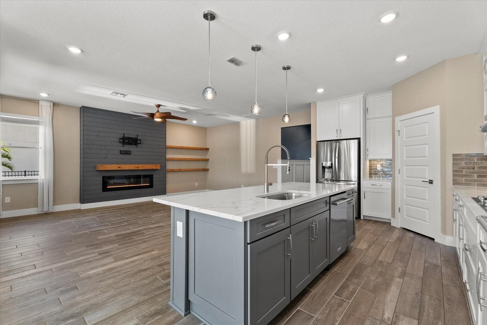 Kitchen opens to spacious living room - 3536 BIG SKY WAY, BRADENTON