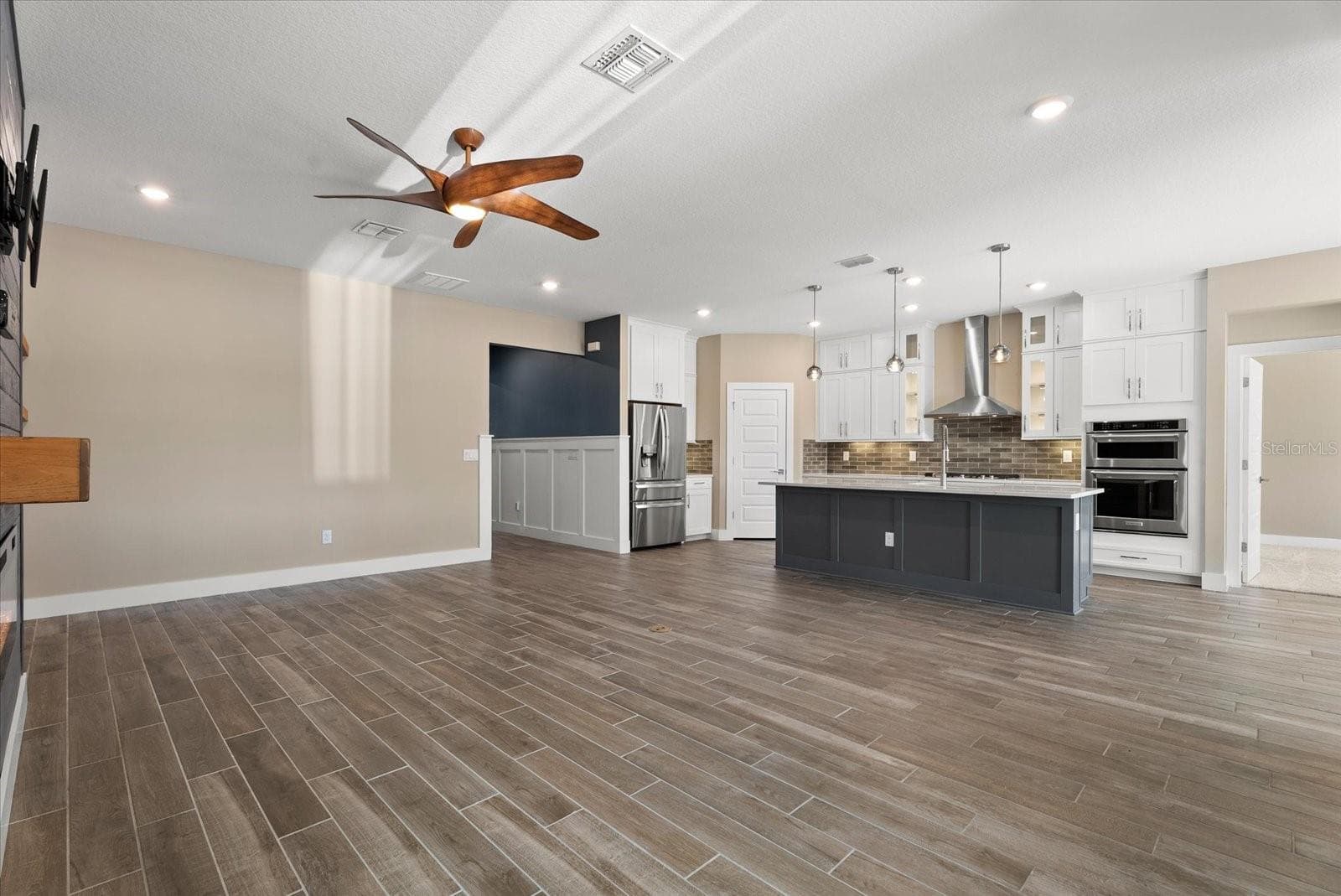 Living room open to kitchen - 3536 BIG SKY WAY, BRADENTON