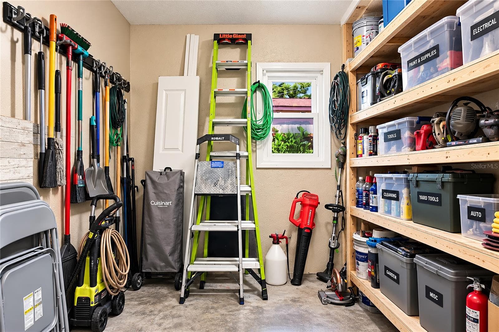 indoor storage adjacent to laundry - 1126 CARMELLA CIR, SARASOTA