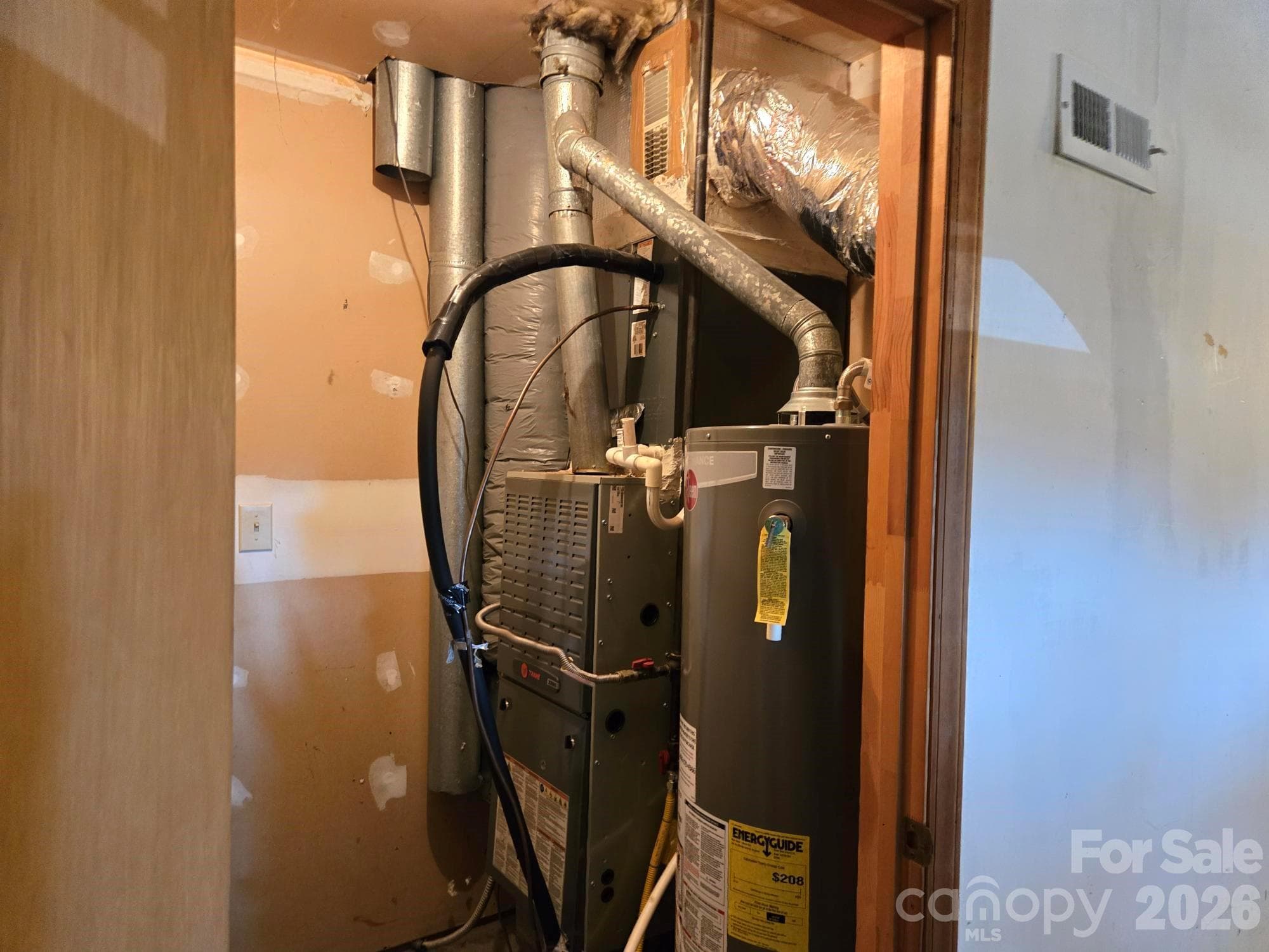Mechanicals Room in the Garage Area. - 6214 Elkington Lane, Mint Hill