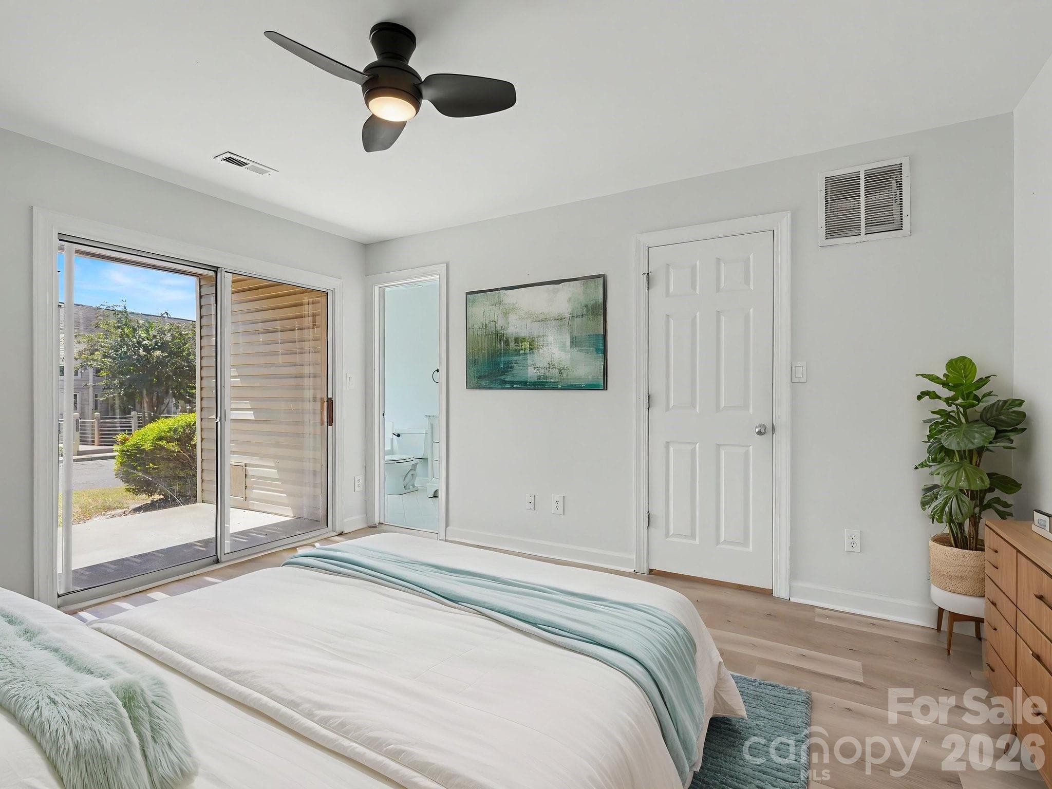 Virtually staged lower primary suite. - 14546 Waterside Drive, Charlotte