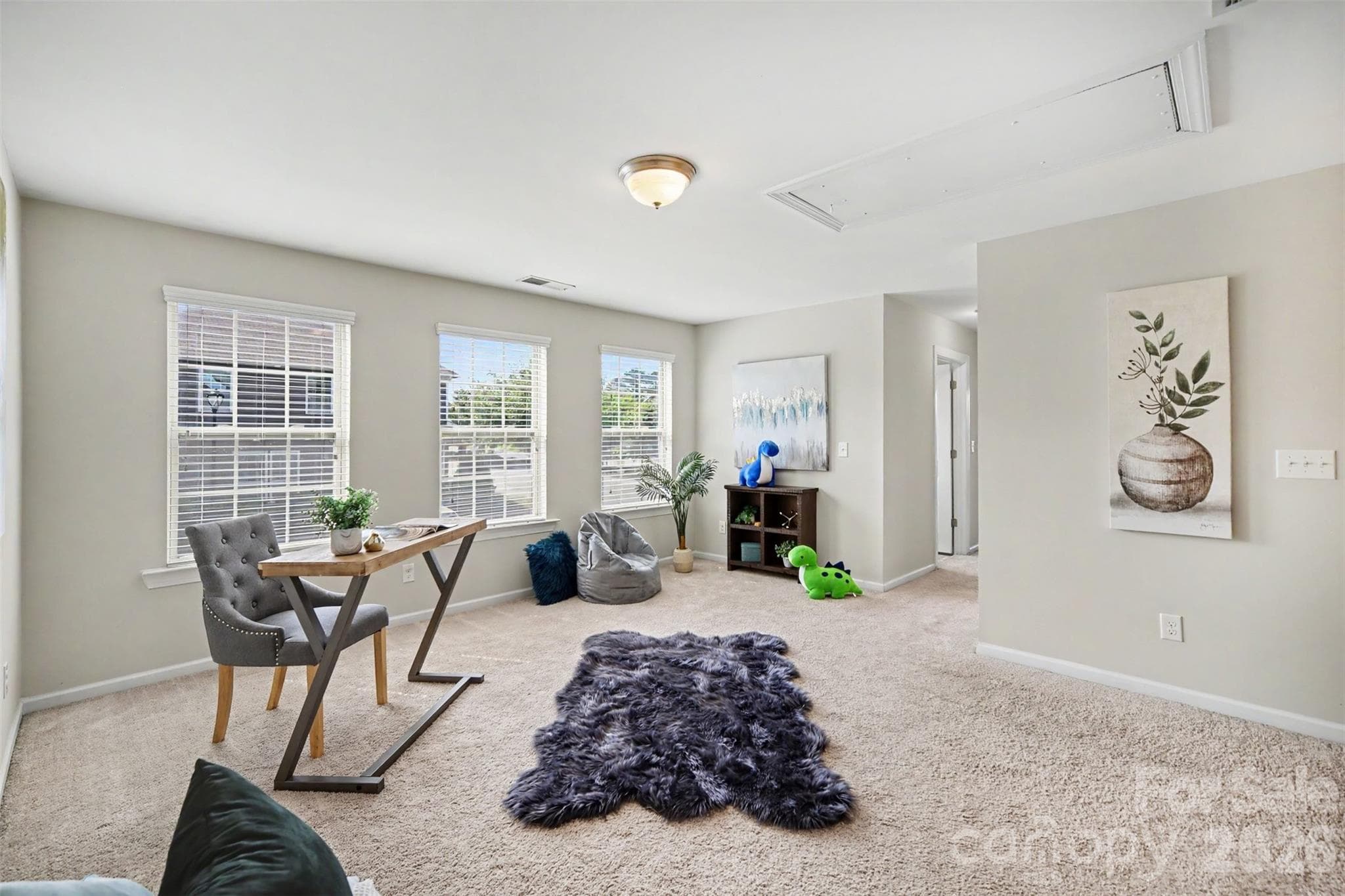 Large loft located in the center of the upstairs floor plan, with closet - 824 Ayrshire Avenue, Fort Mill