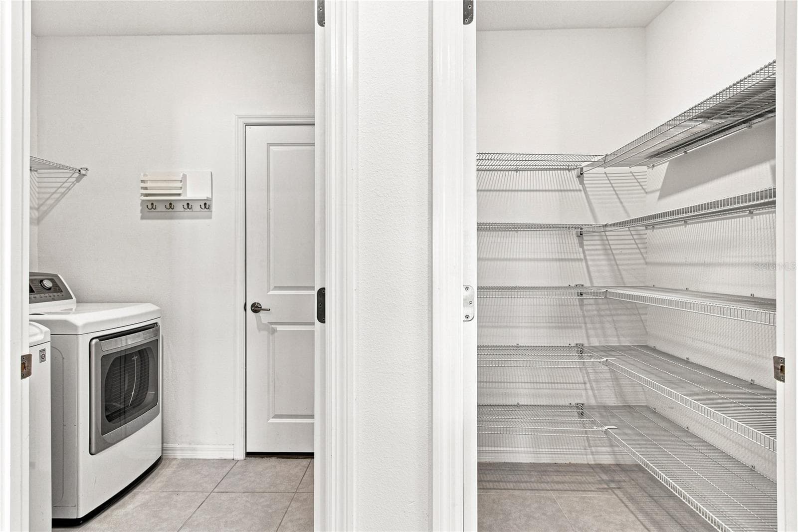 Large Pantry and Laundry Room with Washer and Dryer - 13659 NEWBRIDGE ST, SPRING HILL