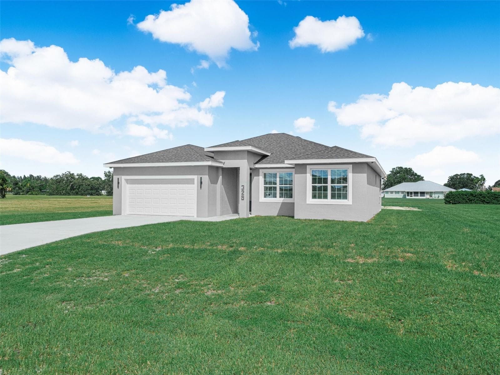 Front 1 - 325 COSTA BRAVO DR, SEBRING