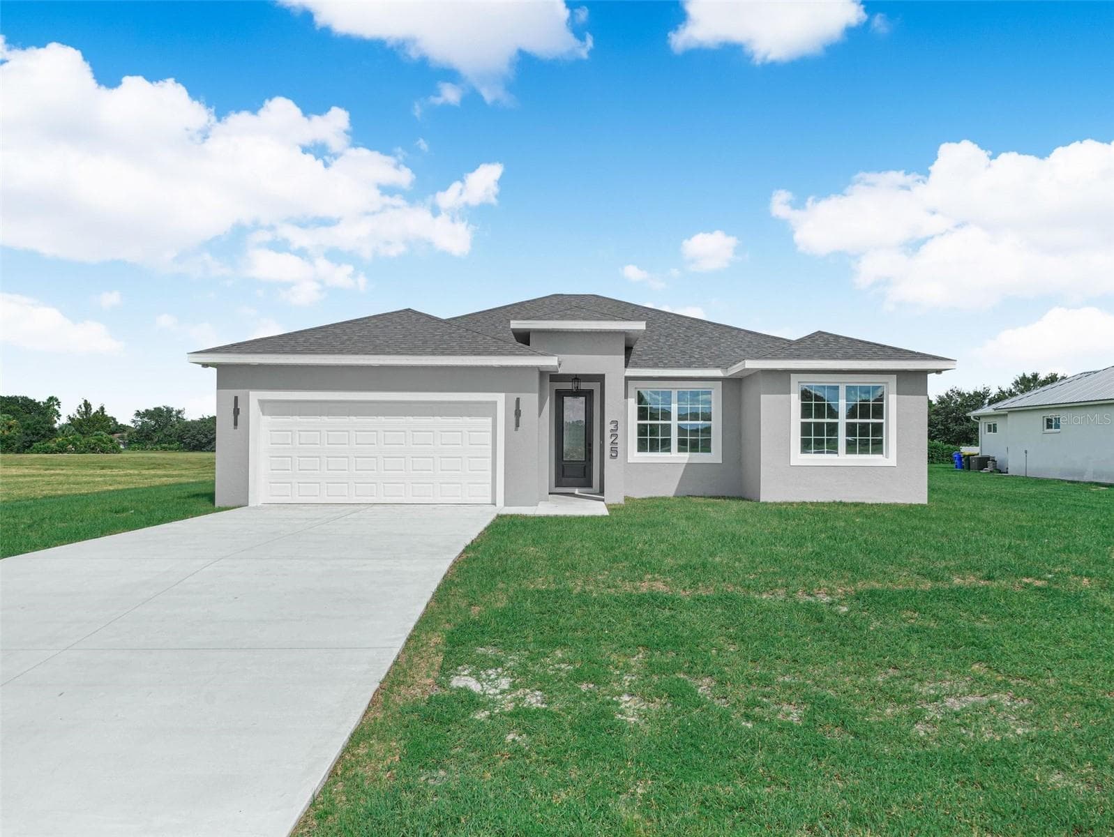 Front 2 - 325 COSTA BRAVO DR, SEBRING