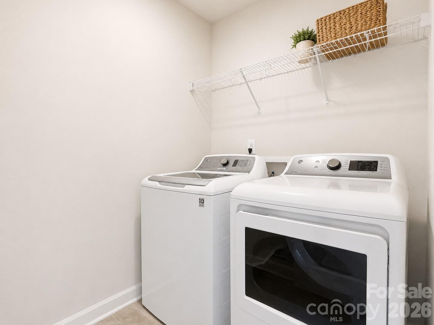 Upstairs Laundry room with storage - 518 Nixon Road, Belmont