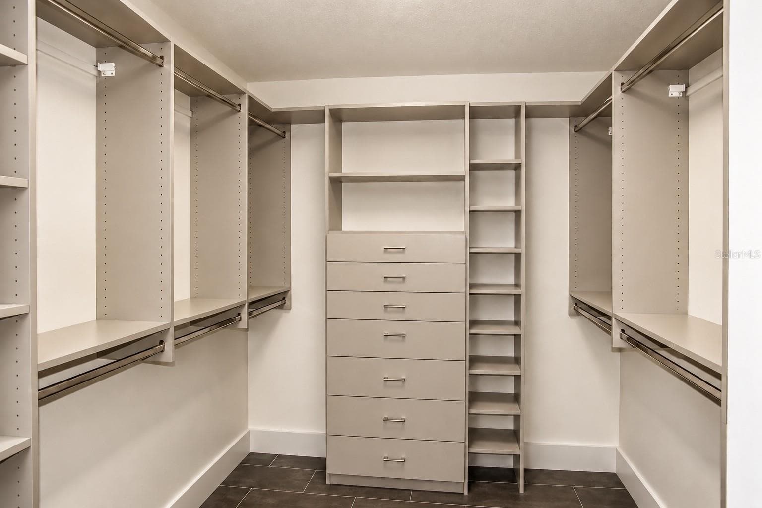 Walk-in closet with custom built-ins - 2 - 9865 SW 74TH AVE, OCALA