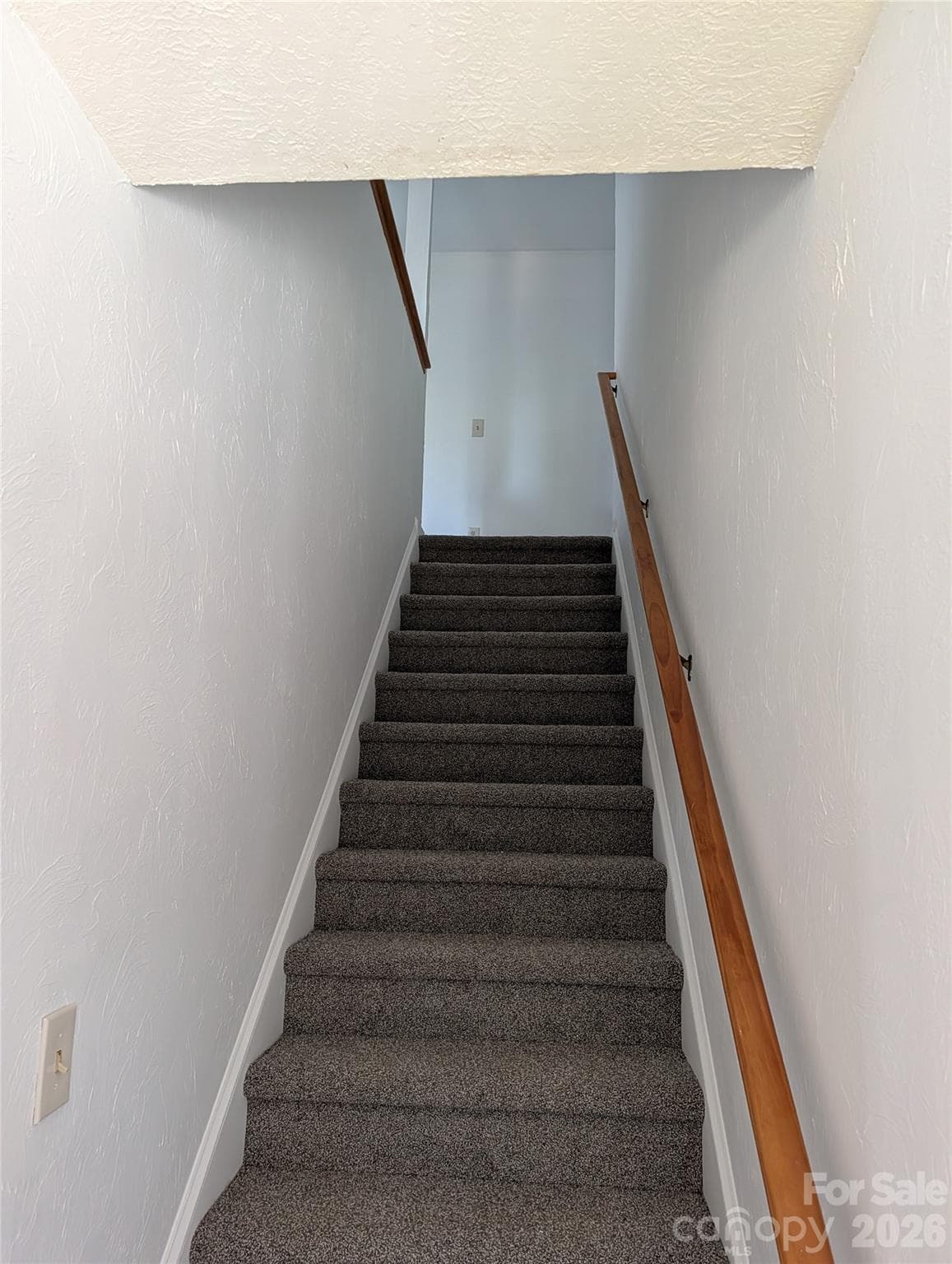 Staircase at front door - 5406 Winding Oak Drive, Hickory