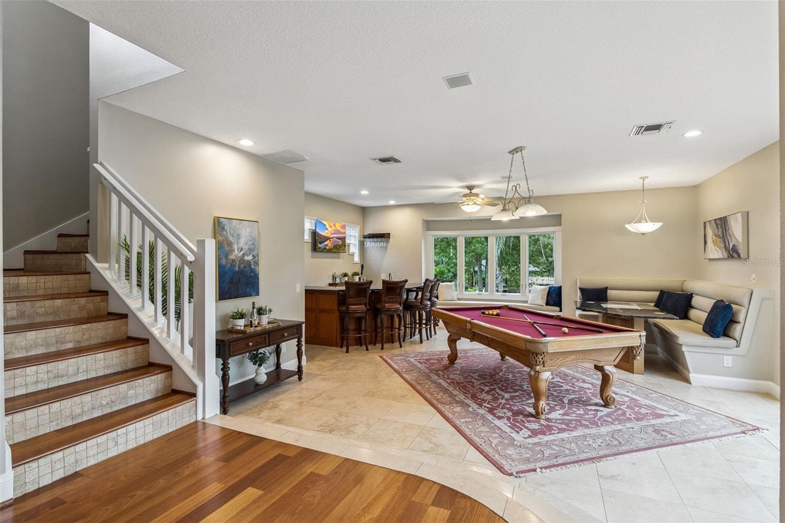 Game room and stairs leading to two bedrooms and one bathroom on 2nd floor - 333 BRANTLEY CLUB PL, LONGWOOD