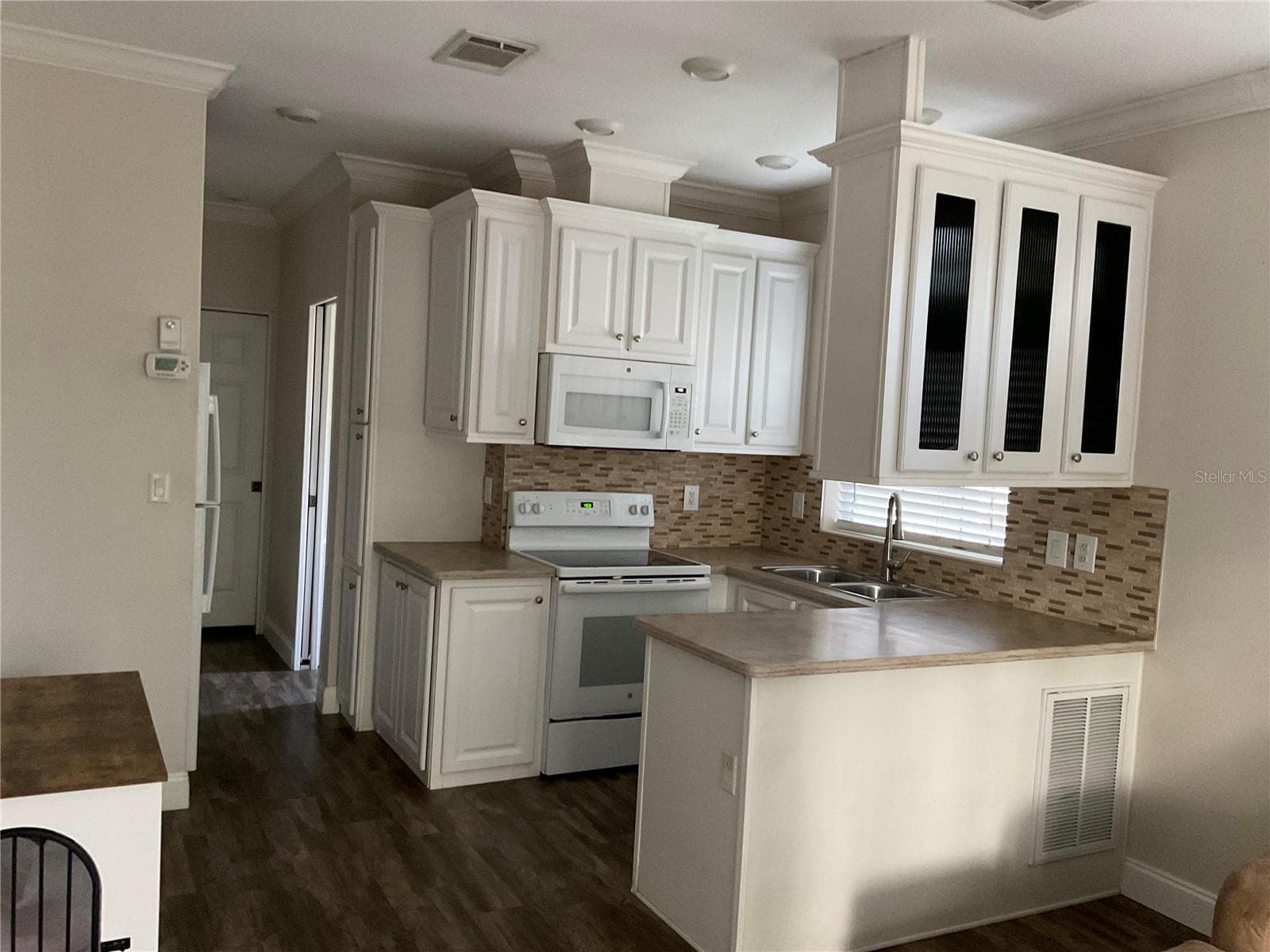 Manufactured Home at 25349 140TH PL NE, FORT MC COY, photo 12 of 36