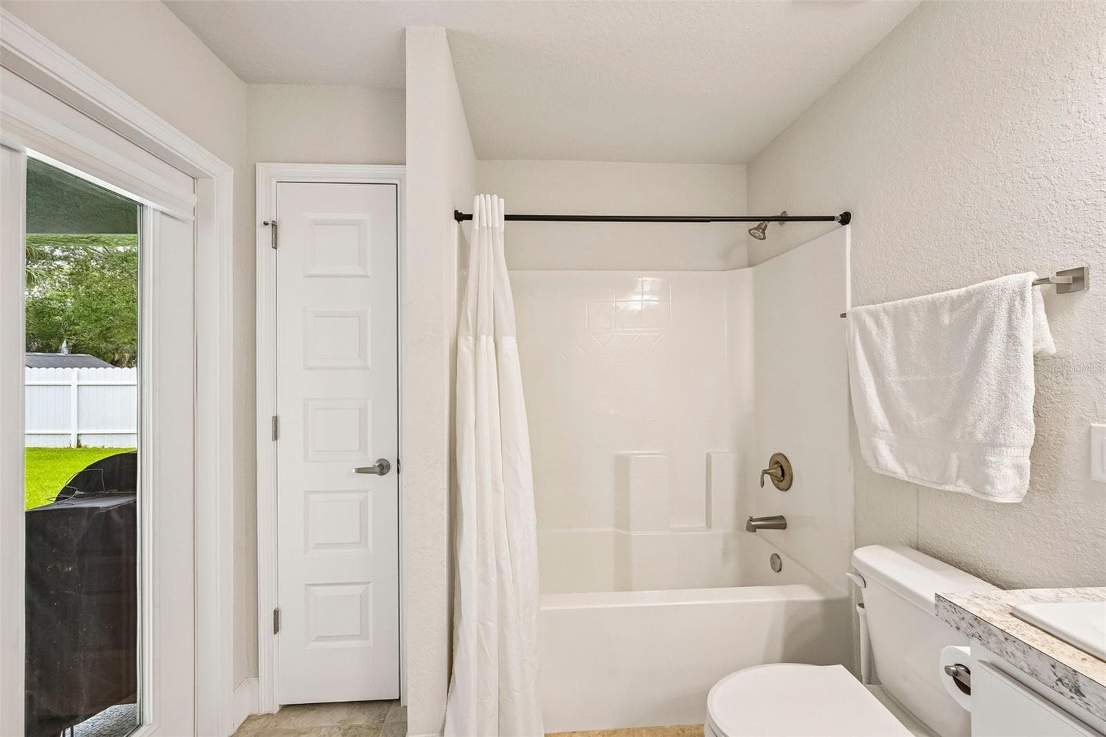 Bathroom 2 leads to outside - 2718 N CHAMBERLAIN BLVD, NORTH PORT