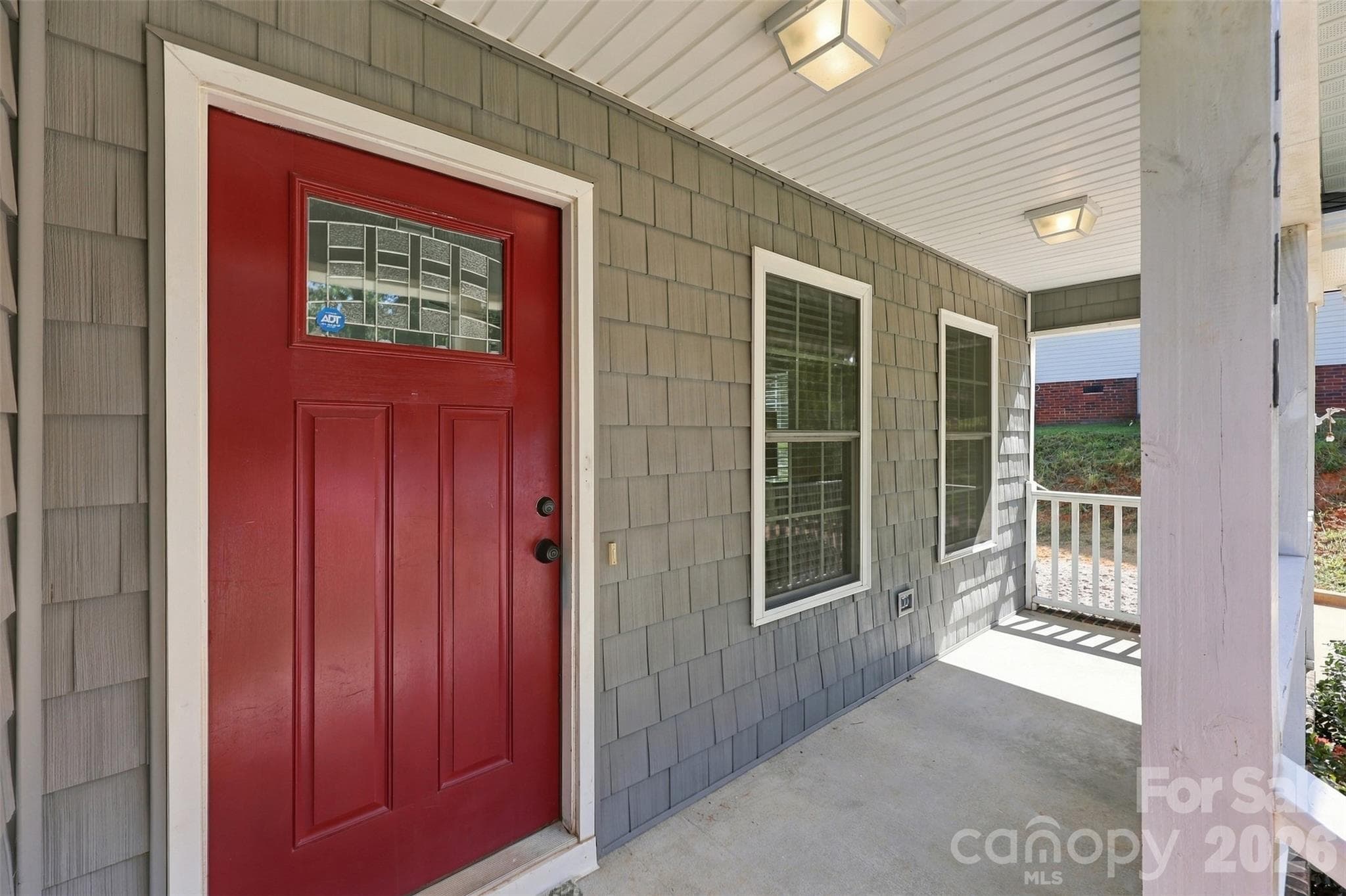 this covered front porch is the perfect place to relax - 1218 Calhoun Street, Rock Hill