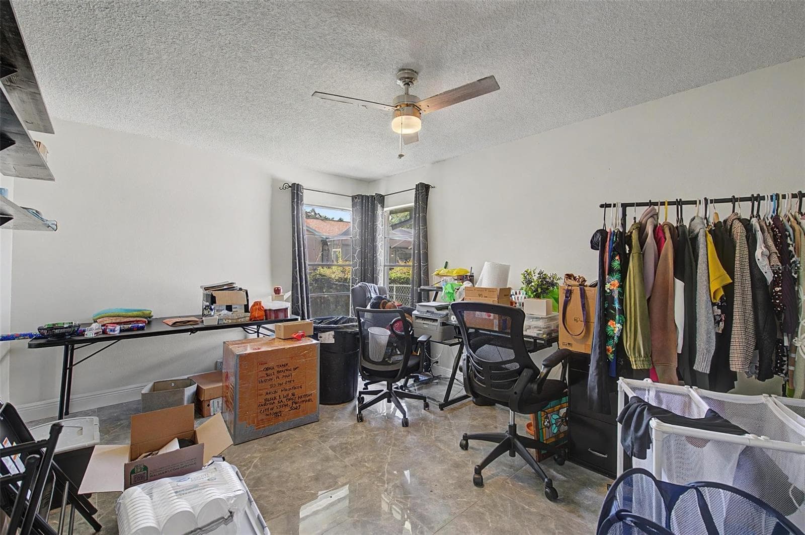 Bedroom 4 (owner utilizing the room as a storage room while packing. - 8612 BRAXTON DR, HUDSON