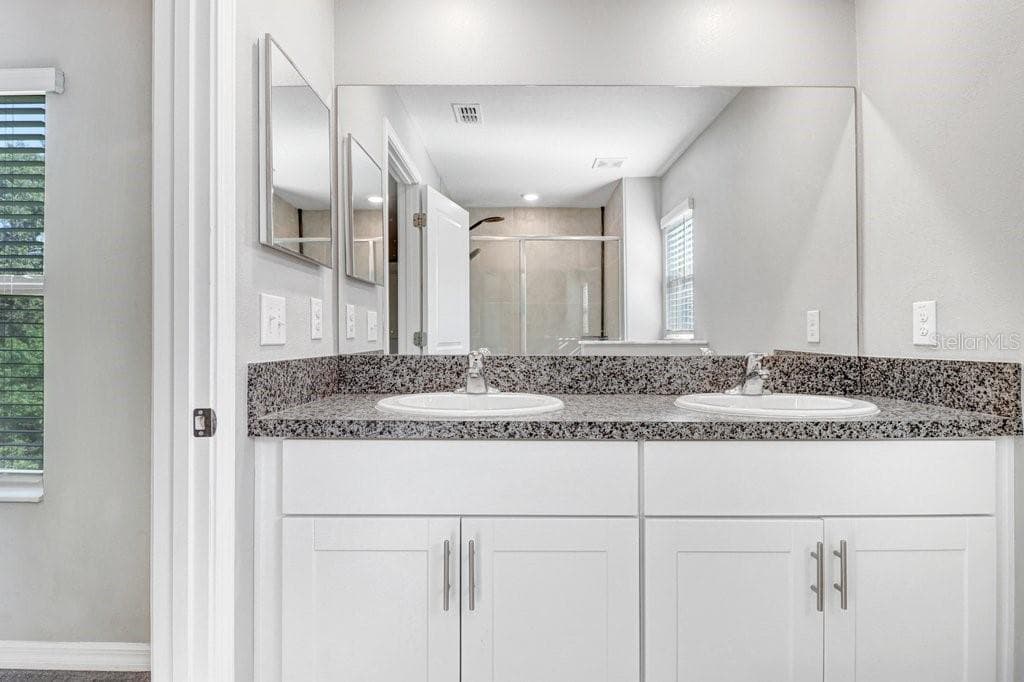 Dual Sink Vanity - 9536 PEMBROOKE PINES DR, SUN CITY CENTER