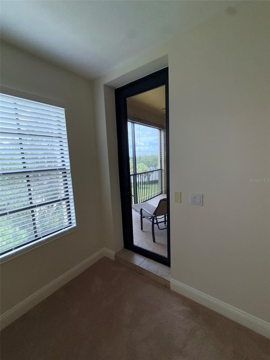 Master to outdoor porch door - 7702 LAKE VISTA CT #303, LAKEWOOD RANCH