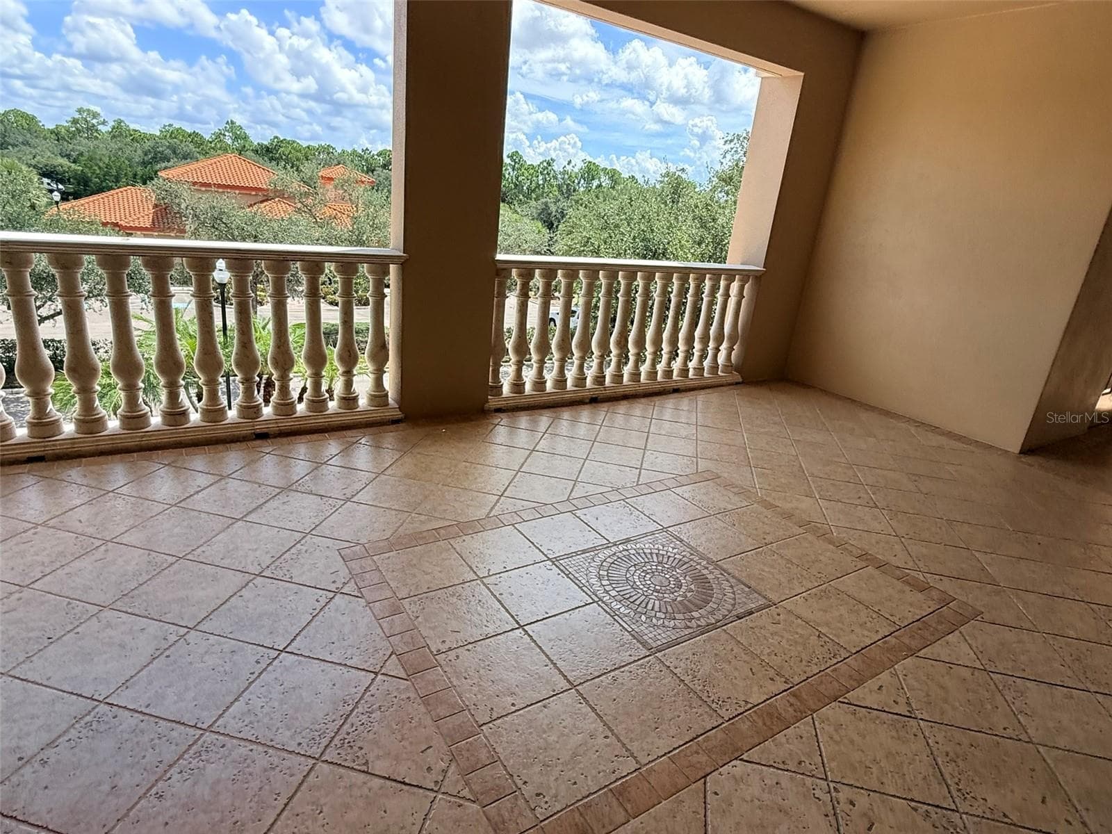 Walkway to Unit - 7702 LAKE VISTA CT #303, LAKEWOOD RANCH
