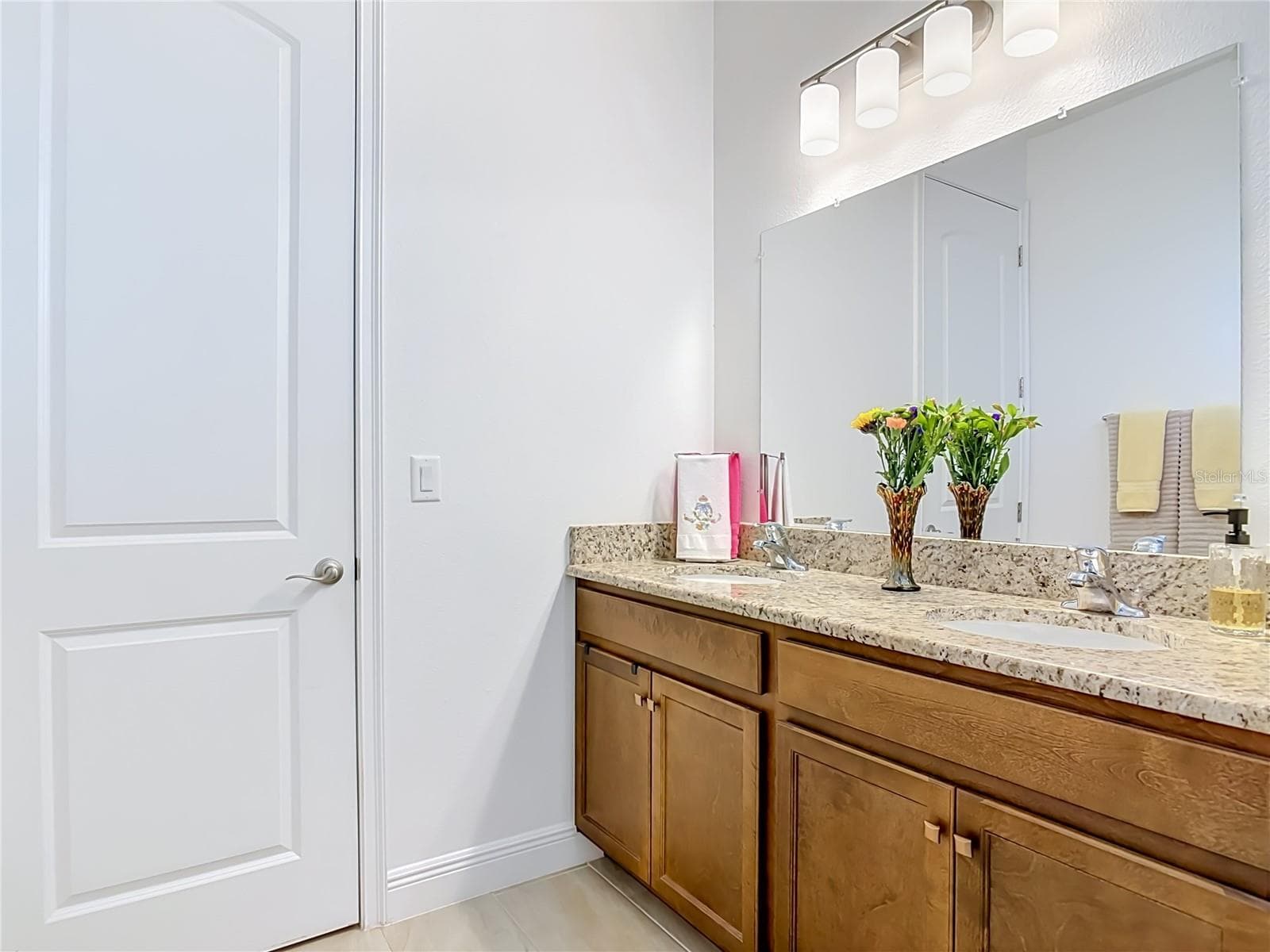 Primary Bath with closet door from bath - 1611 LADY FERN TRL, DELAND