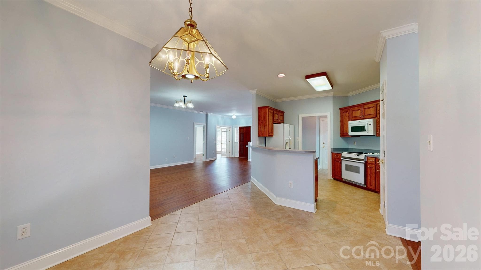 Breakfast room to kitchen - 1137 Millwright Lane, Matthews