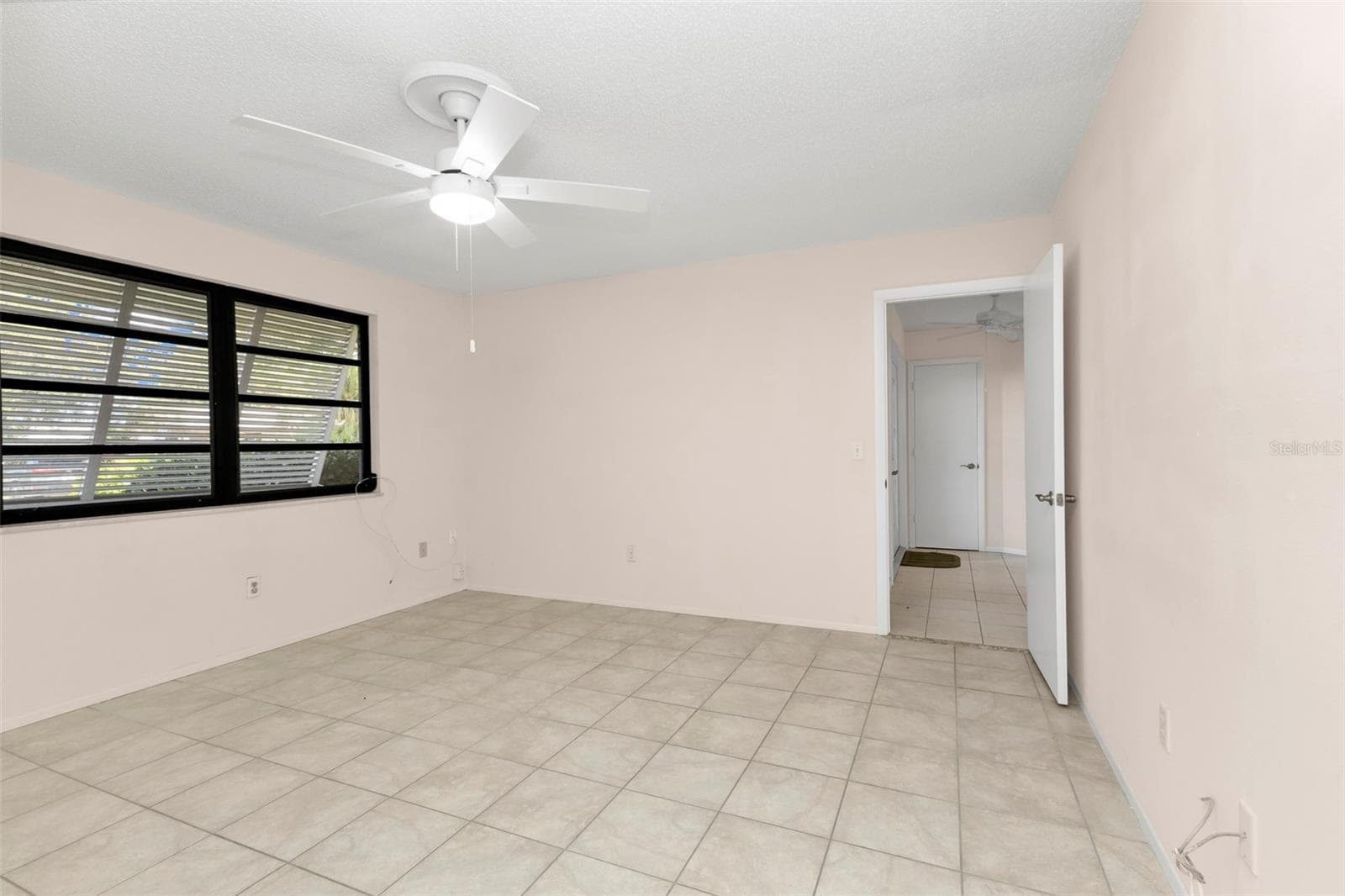 Guest room one off of the front entry - 26212 MADRAS CT, PUNTA GORDA