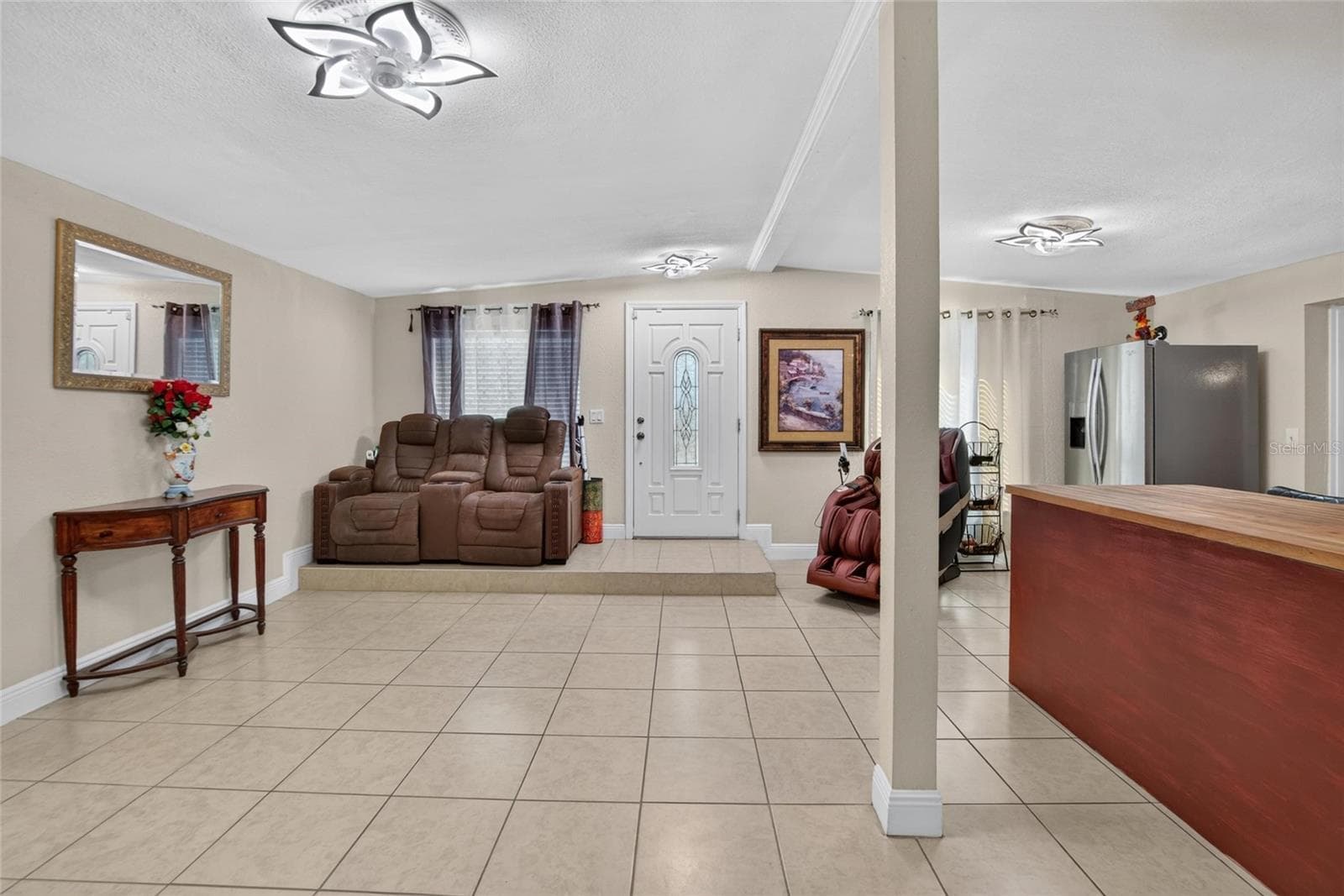 Standing in front of the TV looking at the front door. - 1727 WAIKIKI WAY, TAMPA