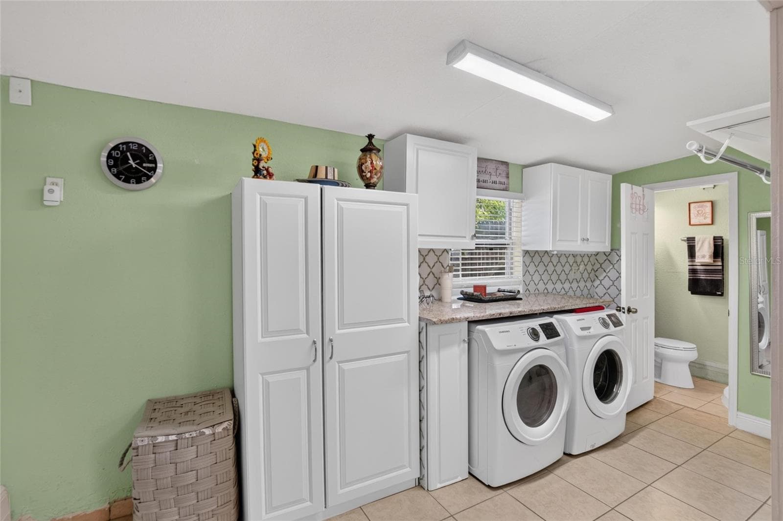 Laundry Area with 1/2 Bath to the right - 1727 WAIKIKI WAY, TAMPA