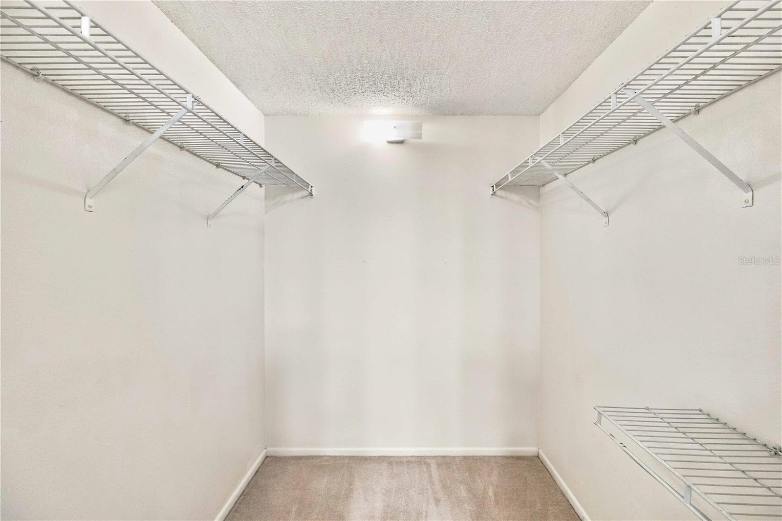 Primary walk in closet - 7294 CLOISTER DR #23, SARASOTA