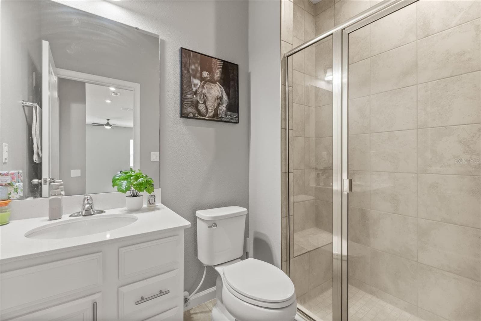 Ground floor full bath adjacent to ground floor bedroom and garage access. - 1596 EUCALYPTUS WAY, DAVENPORT