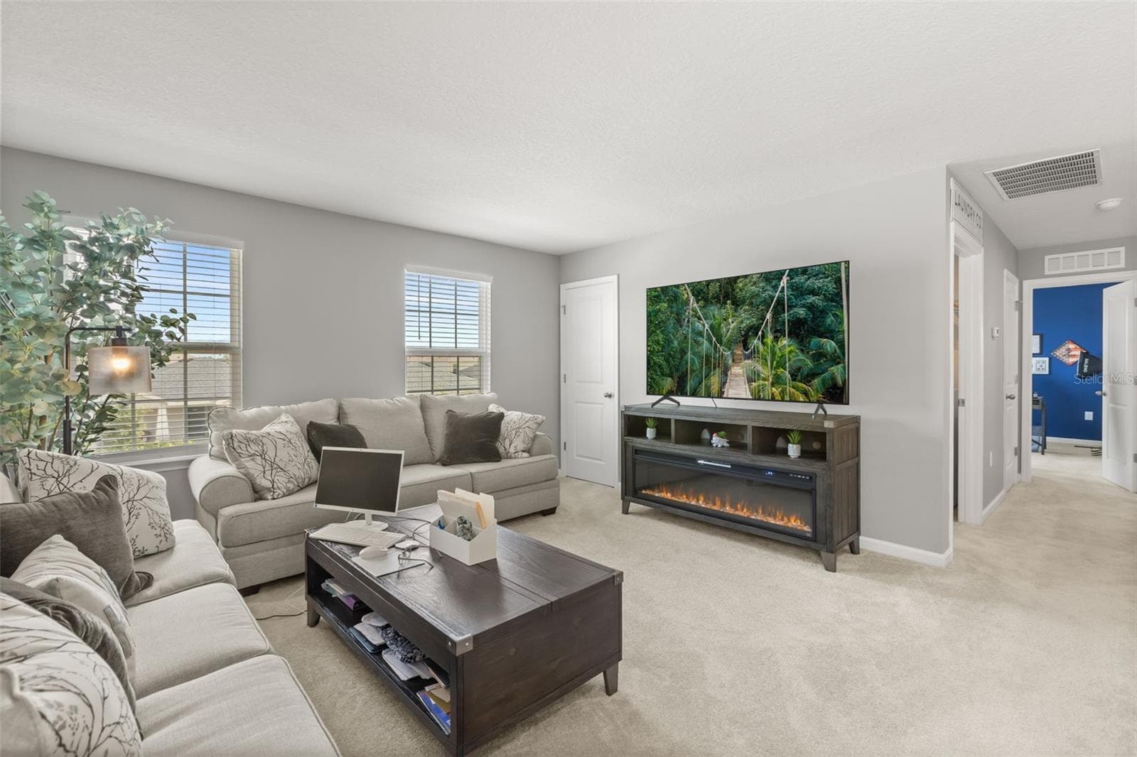 Loft area at second floor, door to walk-in closet, hallway to laundry, 2nd & 3rd bedrooms. - 1596 EUCALYPTUS WAY, DAVENPORT