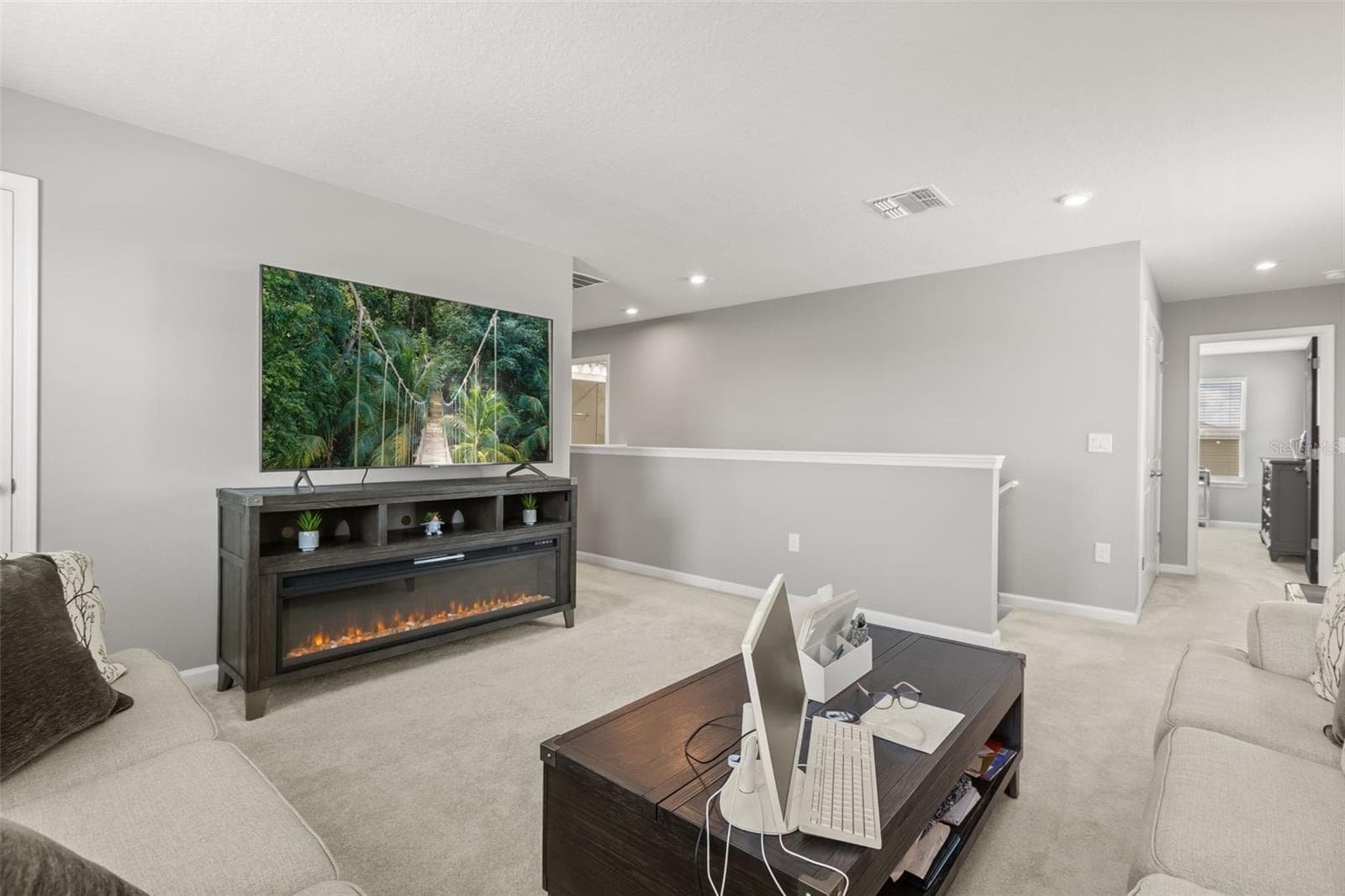 Loft area with view to staircase & hall to primary bedroom. - 1596 EUCALYPTUS WAY, DAVENPORT